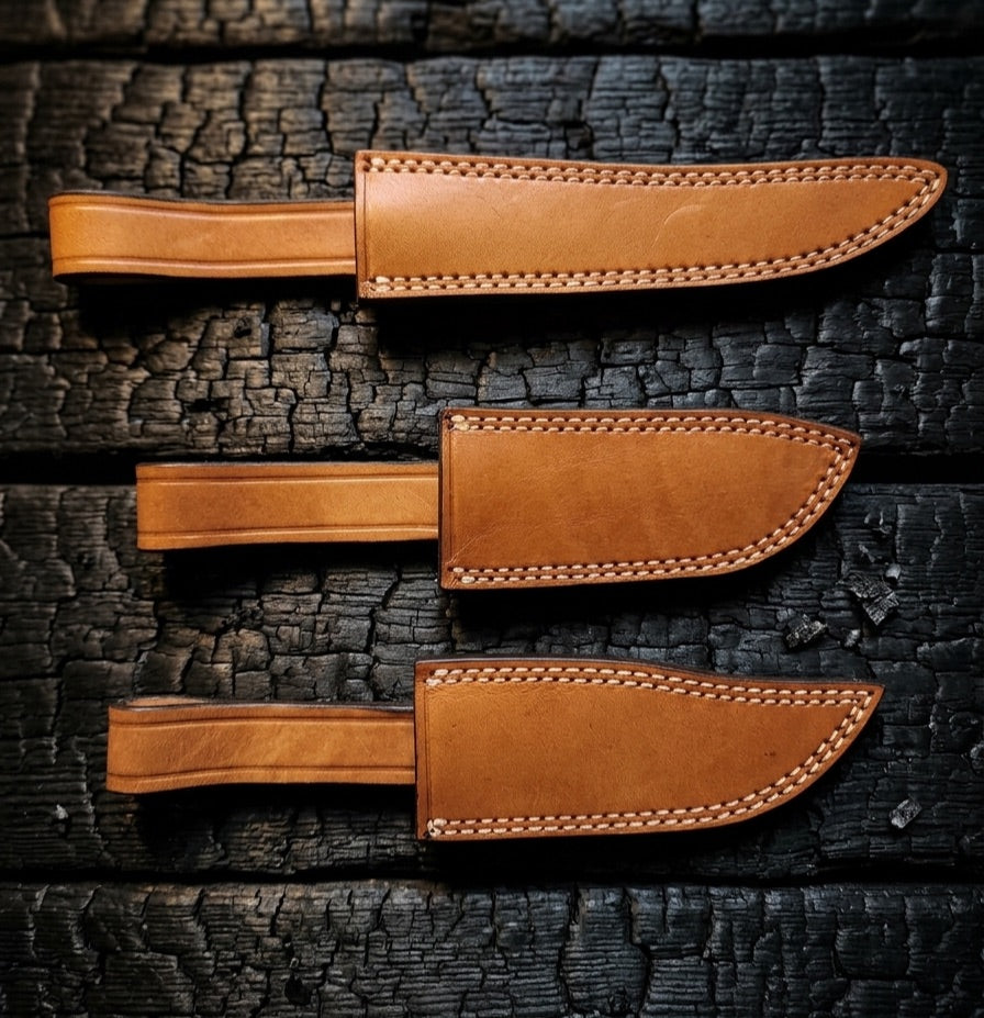 Hand stitched leather sheaths included with knives